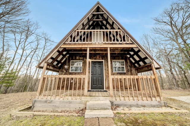 view of front of house featuring covered porch and board and batten siding