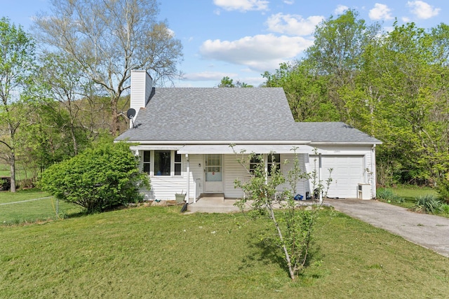 13955 Swallowfield Rd, Frankfort, KY 40601 - view of front of home featuring a garage, fence, aphalt driveway, a front yard, and a porch