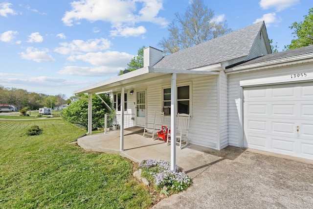 13955 Swallowfield Rd, Frankfort, KY 40601 - view of front of property featuring a chimney, driveway, an attached garage, roof with shingles, and a front lawn