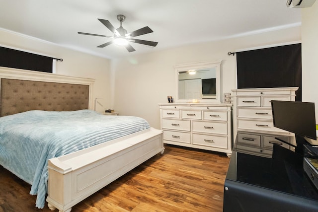 bedroom featuring ceiling fan and wood finished floors