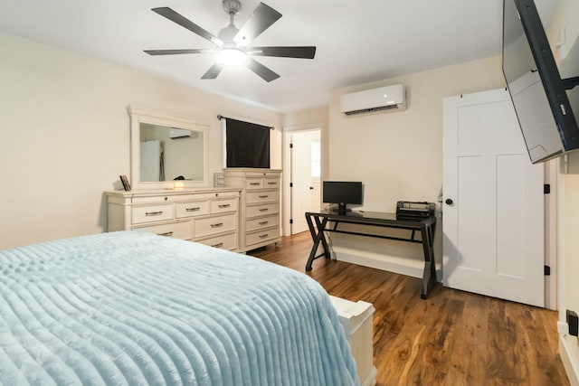 bedroom featuring a wall mounted AC, dark wood-style floors, and ceiling fan