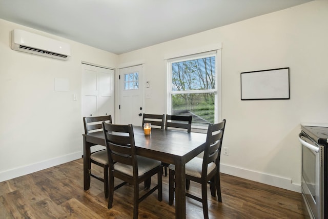 dining room featuring a wall mounted AC, baseboards, and dark wood-style floors