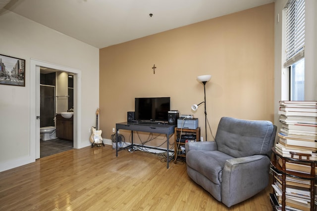 650 S Mill St Unit 219, Lexington, KY 40508 - living area featuring baseboards and wood finished floors