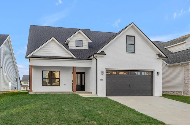 4137 Meadowlark Rd, Lexington, KY 40509 - modern farmhouse featuring driveway, brick siding, a front yard, and a garage