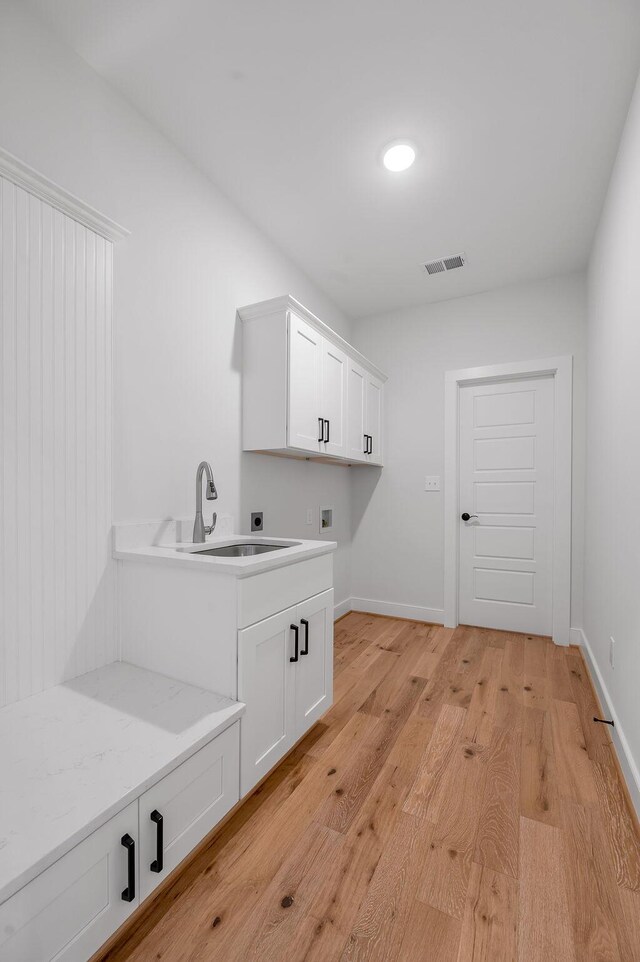4137 Meadowlark Rd, Lexington, KY 40509 - mudroom featuring baseboards, light wood finished floors, a sink, and visible vents