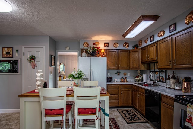 kitchen with fridge with ice dispenser, a sink, a textured ceiling, and black dishwasher