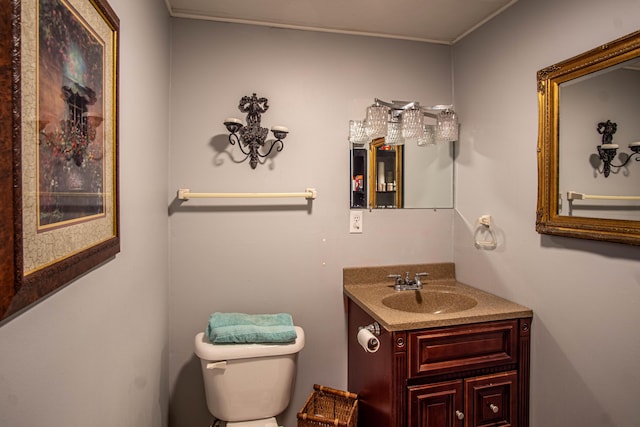 half bath with vanity and toilet