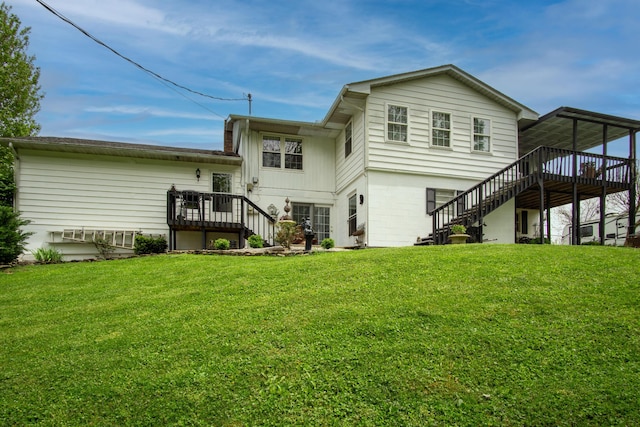 back of house featuring a wooden deck, a yard, and stairs