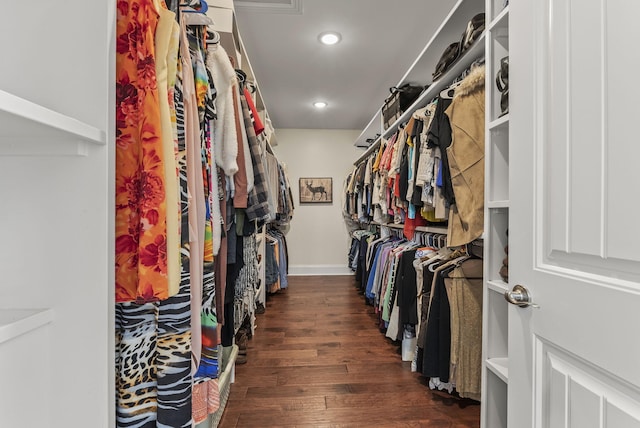 spacious closet with wood finished floors