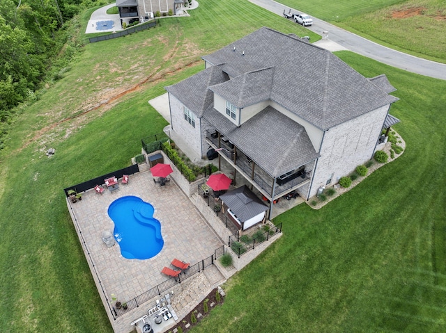 view of subject property featuring a pool