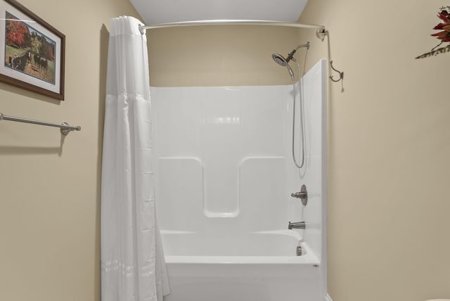 full bathroom with shower / tub combo