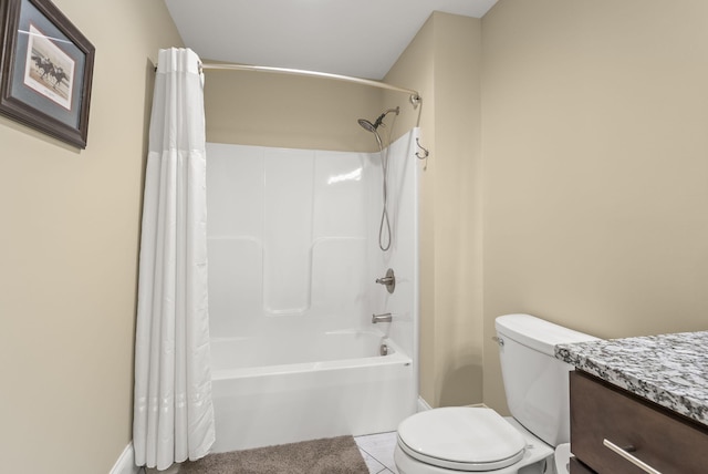 bathroom featuring toilet, shower / bath combo, vanity, and baseboards