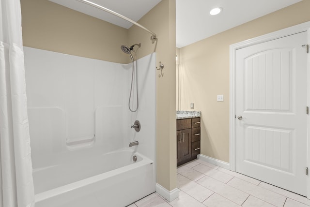 bathroom with tile patterned floors, shower / tub combo, vanity, baseboards, and recessed lighting