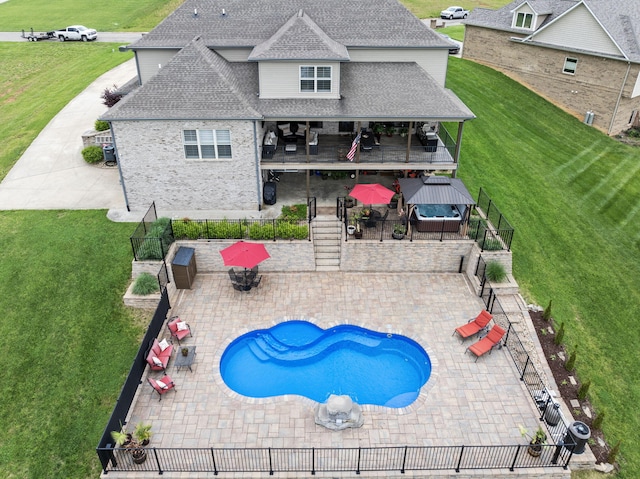 back of house with a patio area, roof with shingles, stairway, a deck, and a gazebo