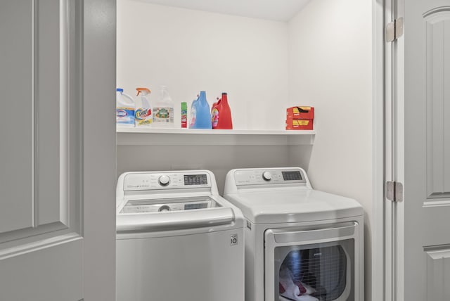 laundry area featuring washer and clothes dryer