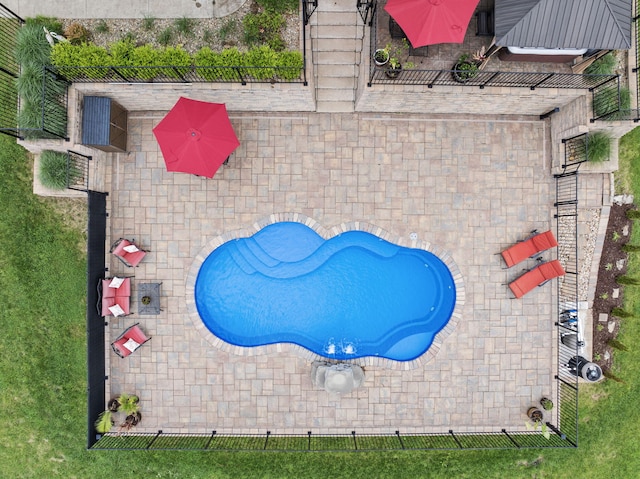 drone / aerial view of a pool area