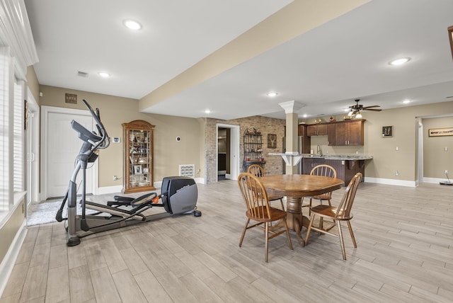 dining area with baseboards, light wood-type flooring, ornate columns, ceiling fan, and recessed lighting