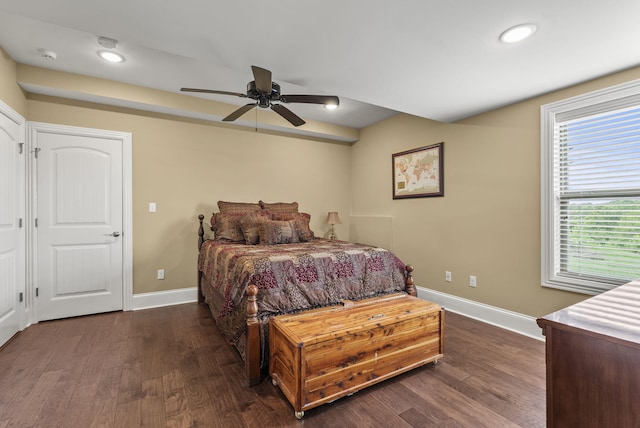 bedroom with baseboards, dark wood-style floors, recessed lighting, and a ceiling fan