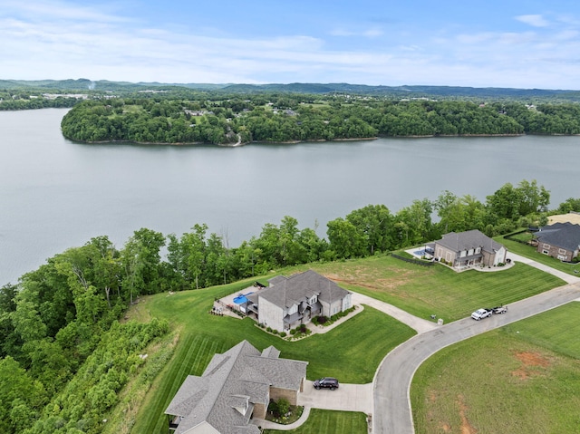 view of subject property featuring a nearby body of water