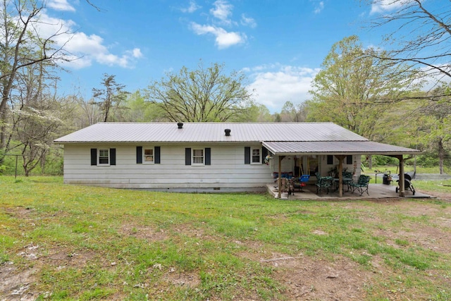 597 Snow Creek Rd, Clay City, KY 40312 - back of property with a lawn, crawl space, a patio, and metal roof