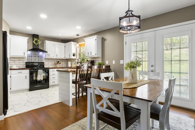 370 Poplar Ln, Morehead, KY 40351 - dining room featuring recessed lighting, wood finished floors, and an inviting chandelier