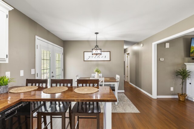 370 Poplar Ln, Morehead, KY 40351 - dining area with baseboards, a chandelier, and dark wood-style flooring
