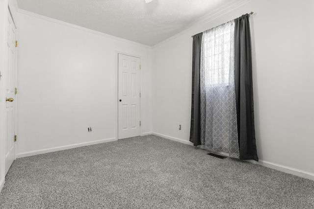 370 Poplar Ln, Morehead, KY 40351 - carpeted empty room featuring baseboards, crown molding, a textured ceiling, and visible vents