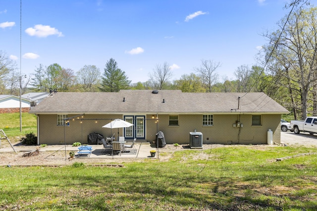 370 Poplar Ln, Morehead, KY 40351 - rear view of house featuring a patio area, a lawn, and central AC unit