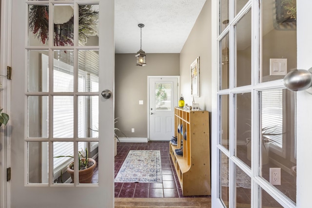 370 Poplar Ln, Morehead, KY 40351 - entryway with plenty of natural light, french doors, baseboards, and a textured ceiling