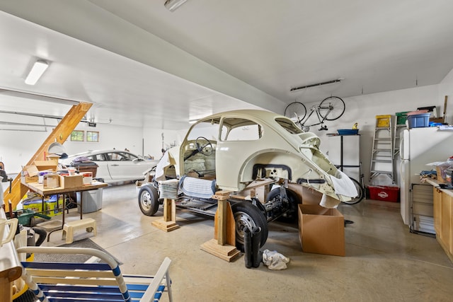 garage featuring freestanding refrigerator