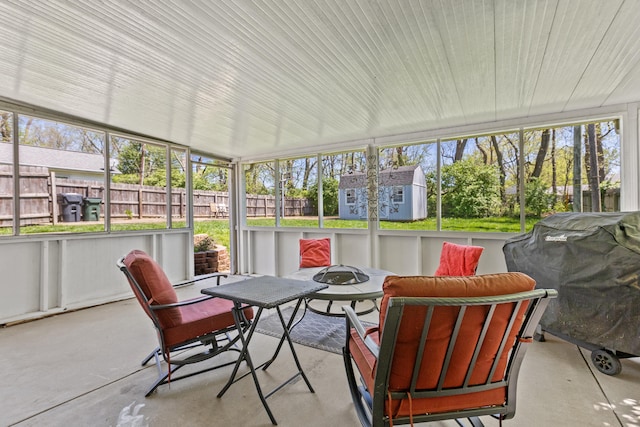 sunroom with an outdoor fire pit