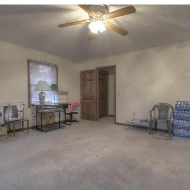 102 Locust St, Manchester, KY 40962 - interior space featuring carpet flooring and a ceiling fan