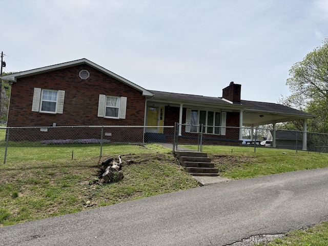 102 Locust St, Manchester, KY 40962 - ranch-style home featuring a chimney, brick siding, fence private yard, and a front yard