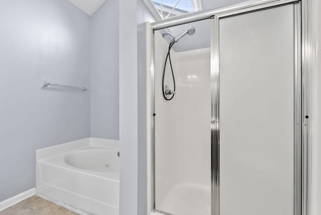 533 Lanarkshire Pl, Lexington, KY 40509 - full bath featuring a shower stall, a garden tub, and tile patterned floors