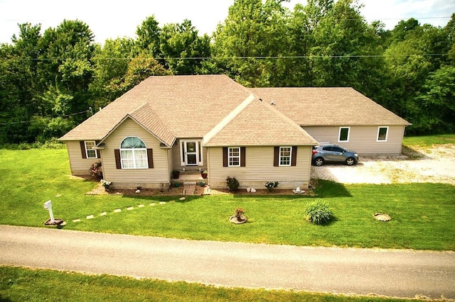 88 Powell Rd, Mckee, KY 40447 - view of front of property featuring a front lawn and a shingled roof