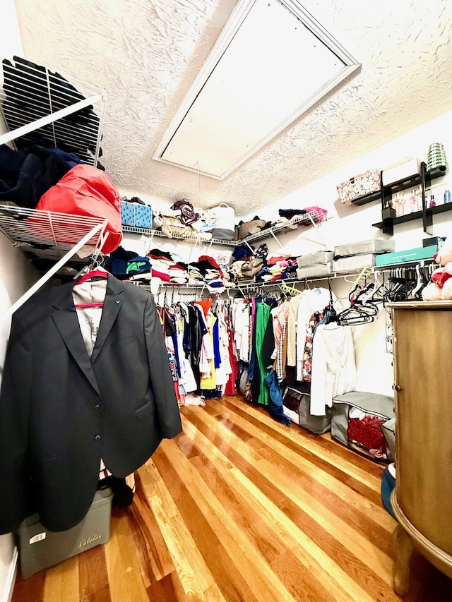88 Powell Rd, Mckee, KY 40447 - walk in closet with attic access and wood finished floors