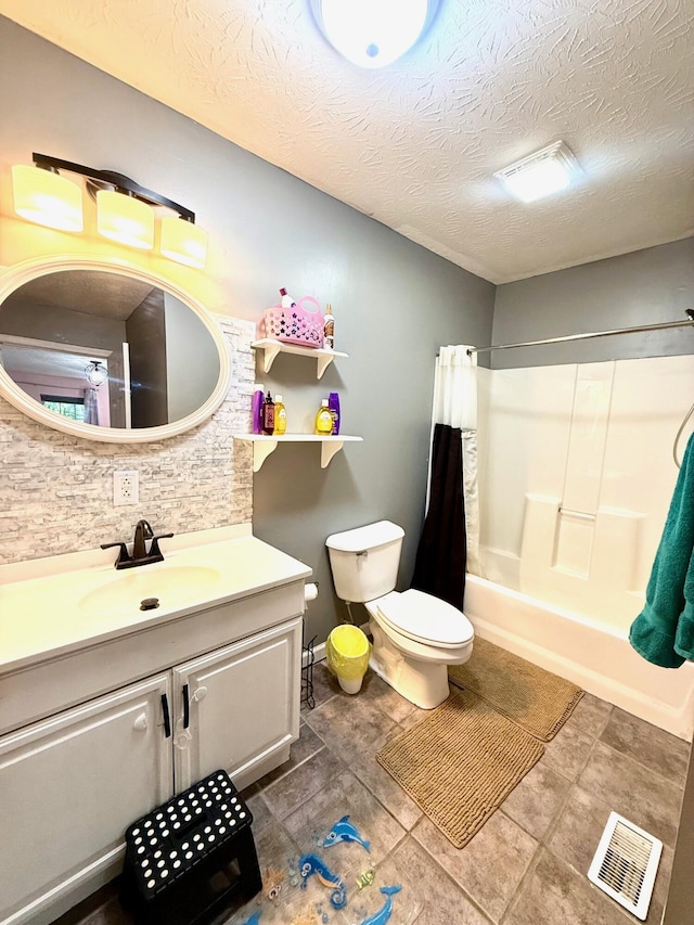 88 Powell Rd, Mckee, KY 40447 - full bath with vanity, shower / bath combo, toilet, tile patterned flooring, and a textured ceiling