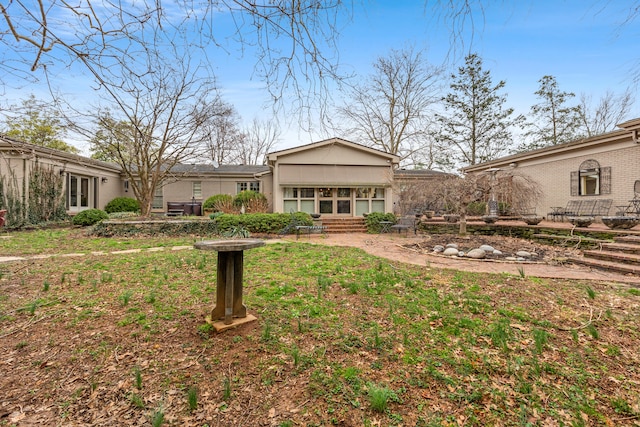 3037 Tates Creek Rd, Lexington, KY 40502 - mid-century inspired home featuring brick siding