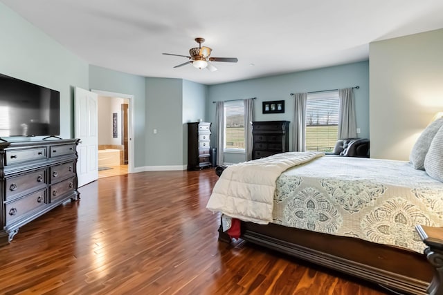 bedroom featuring baseboards, wood finished floors, and ceiling fan