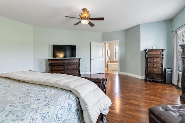 bedroom featuring dark wood finished floors, baseboards, and ceiling fan