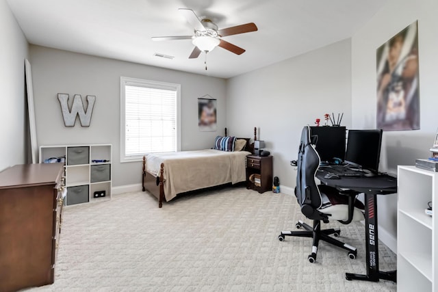 bedroom with carpet floors, visible vents, baseboards, and ceiling fan