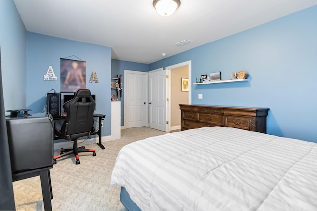 bedroom featuring carpet and baseboards