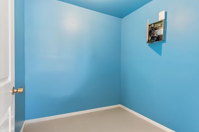 empty room with baseboards
