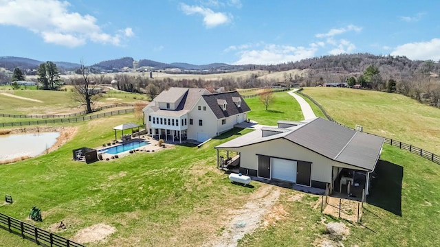 aerial view featuring a rural view and a mountain view