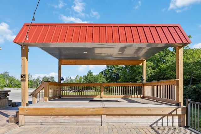wooden terrace with a gazebo
