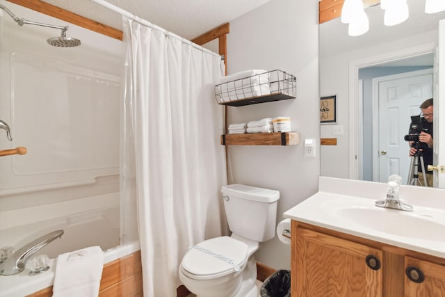 bathroom featuring toilet, vanity, and shower / bath combination with curtain