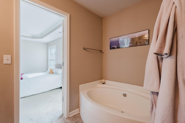 ensuite bathroom with ensuite bathroom and a bath