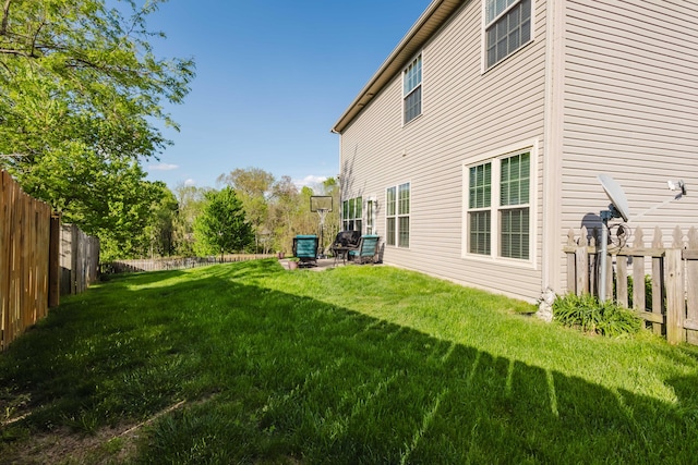 view of yard featuring a fenced backyard