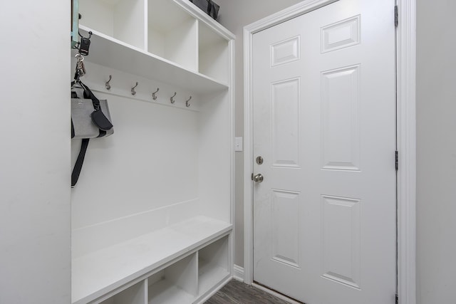 mudroom with dark wood-style floors