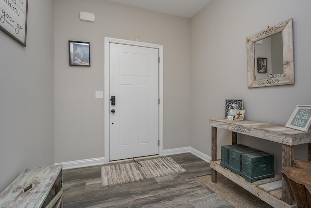 entrance foyer with wood finished floors and baseboards